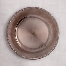 They are mainly designed to get pieces of food and avoid spills and clutter that in some way or another would stain the tablecloth. Ksp Everyday Charger Plate Beaded Rim Bronze Kitchen Stuff Plus