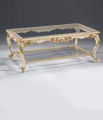 Often, they were created with curvature legs and a hidden drawer. Louis Xvi Style Carved Wood Coffee Table In Antique White Finish And Antique Gold Leaf Accents With Clear Coffee Table Antique Coffee Tables Coffee Table Wood