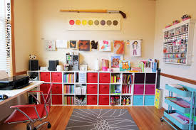 A utility sink allows kids to clean up after messy art projects. Under A Cherry Tree Jin Kids Craft Room