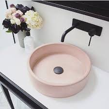 a blush pink concrete sink. i mean it's