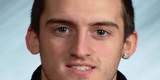 Hope swim teams split with Calvin