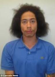 Dramatic moment gang of youths wrench mobile and tablets from phone shop