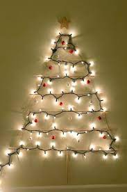 Wooden Christmas Tree Margeaux You Could Make This Tree This Year Just Need Some Dowel Wall Christmas Tree Unique Christmas Trees Wall Mounted Christmas Tree