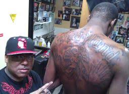 Above the u in the fixed version you can see the remnants of the top of the old t. it's easier to fix a tattoo immediately after you get it because the wound is still fresh and the ink hasn't set yet. Kevin Durant Gets New Maryland Back Tattoo Pictures