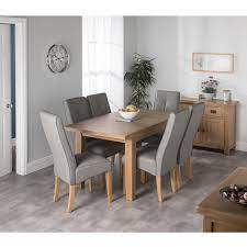 …  read more  to complete the look dfs also have a range of sideboards, accent chairs and occasional tables.most of our dining tables come with 4 dining chairs but if you need seating for. Cotswold Oak Dining Table Set With 6 Grey Milan Chairs Buy Online At Qd Stores
