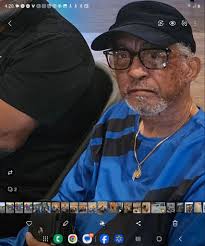 Raymond sharing a message at Howard's wake