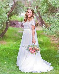 Modest Wedding Dress With Flutter Sleeves And A Flowy Skirt From Alta Moda Modest Bridal Dream Wedding Dresses Modest Wedding Dresses Modest Bridal Gowns