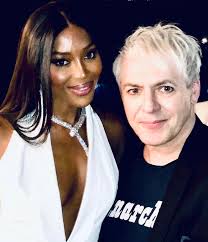 Nick and Naomi tonight at the opening of her exhibition at the V&A in  London. 📸 Alan Edwards