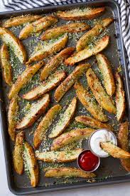 Thoroughly wash potatoes, cut in half, and slice into wedges. Baked Garlic Parmesan Potato Wedges Cooking Classy