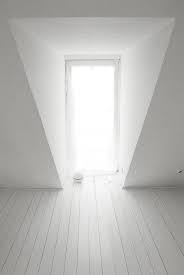 the windows were ajar and gleaming white against the fresh grass outside that seemed to grow a little way into t white room white rooms interior design styles