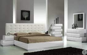 The black lacquer bedroom furniture stands as a fine contrast both to the white painted wall and the unaltered wooden ceiling and wooden floors, which together combine the light and the dark, the hot and the cold. Milan White Lacquer Platform Bedroom Set From J M 17687 Q Coleman Furniture