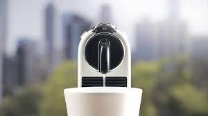Put a cup under the coffee sprout. Nespresso Citiz How To Video Descaling Youtube