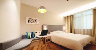 Go with a kitchenette with updated appliances and an island, a small space to put a couch for lounging, a half wall to create the boundaries of a bedroom, and a bathroom. How To Make A Studio Bedroom In Your Basement For 700