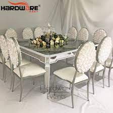 The mirrored finish add a subtle layer of elegance and glamour to these highly functional design. China Lxury Mirror Glass 12 Seater Mirror Glass Top Dining Table Set China Triangle Glass Dining Table Cheap Table And Chair Rentals