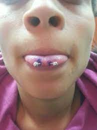 Snake Eyes Piercing Ultimate Guide With Images Snake Eyes Piercing Double Tongue Piercing Eye Piercing
