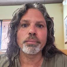 What can I use a self-contained hydraulic bolster steer scissor lift for?