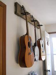 1×4 board (12″ per holder, i used maple). Make It Easy To Do Your Thing Diy Guitar Hanger Diy Guitar Stand Guitar Hanger Guitar Wall Hanger