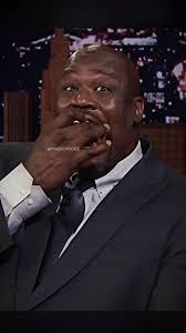 Shaquille Oneal Eating A Donut