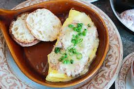 The Floridian Omelette Cream Cheese Filling Garlic Butter And Crab Topping With Green Onions Another Broken Egg Omelets Recipe Cheese Omelette Recipe Food