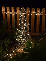 Create Your Own Christmas Tree Using A Tomato Cage Turn Tomato Cage Upside Down Tie Togeth Tomato Cage Christmas Tree Tomato Cages Beautiful Christmas Trees