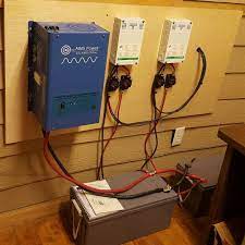 Just Finished One Sweet Setup 8 250watt Panels 4kw Inverter Charger 2 35amp Charge Controllers 800ah Agm Solar Battery Bank Solar Battery Solar Panels