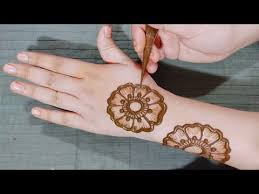 Moving to the central part of the mehndi designs that are the tikki, its got embellishments to it, it's a lot fancier in the two pictures. With Banglell Diwali Gol Tikki Mehndi Design Free Mp4 Video Download Jattmate Com