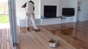 A pretty soft gray paint on breakfast nook floors grounds white furnishings and walls. Painted Floors Cool Tricks To Getting Painted Wood Floors Right