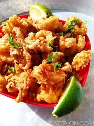 Fried calamari is a lot easier to make at home than you might think! Beer Battered Fried Calamari Recipe The Nyc Talon Recipe Calamari Recipes Fried Calamari Battered And Fried