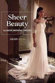A Wedding Dress With Illusion Fabric Is An Elegant Way To Show A Little Skin Look For Mesh Accents Gracing Necklines Wais Wedding Dresses Bridal Gowns Bridal