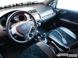 Check Out Marcus Chin S Award Winning 2007 Honda Fit Sport With Its T1r Turbo Kit Custom Airbag Suspension Jdm Fit Honda Fit Honda Fit Custom Honda Fit Sport