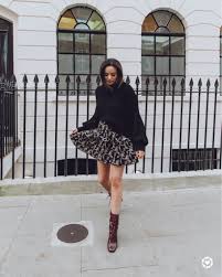 Chihuahua sniffing dog bowl in front of. Oversized Black Jumper With Floral Skirt Mini Skirts Fashion Burgundy Boots Ankle