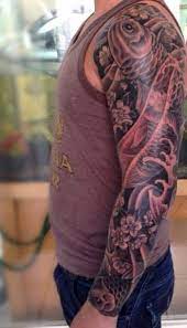 Top 47 Koi Fish Tattoo Ideas 2021 Inspiration Guide Koi Fish Tattoo Tattoos For Guys Tattoos