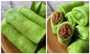 Malaysia popular sweet dessert with coconut known as kuih ketayap. 10 Different Types Of Kuih That Are Local Favourites