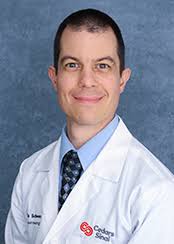 Justin K. Scheer, MD