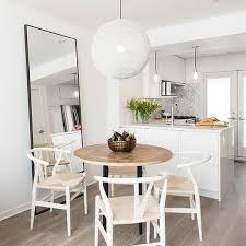Think large dining table, larger mirror. Dining Room Leaner Mirror Design Ideas