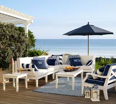 Preppy Navy And White Patio Furniture Make For The Perfect Seaside Setting White Patio Furniture White Outdoor Furniture Patio Decor