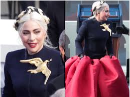Scroll to see the pic. Lady Gaga Picks Out A Custom Schiaparelli Dress For Inauguration Instantly Gets Compared To The Hunger Games Pinkvilla