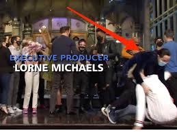 He sat atop a high platform area on the stage that overlooked the crowd. Watch Pete Davidson And Machine Gun Kelly Fall Off The Snl Stage