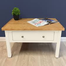 Painted round coffee table with nailhead trim accent from pink postcard. Charlton Painted Oak Storage Coffee Table Oak Direct