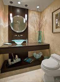 By upgrading small details like your storage, mirror, or bath mat, you can swiftly elevate the look and feel of your bathroom without having to put a sledgehammer through. Small Bathroom Decorating Ideas Home And Garden Decor Guest Bathroom Decor Brown Bathroom Decor Elegant Bathroom