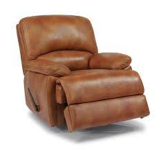 Classic Honey Color Rocker Recliner Timeless Padded Chaise Recliner And Padded Arms Ultimate Comfort Is Found In Leather Recliner Recliner Leather Chaise