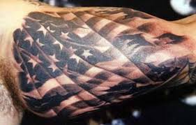 The bold and bright colors of the american flag really standout in this tattoo. 25 Awesome American Flag Tattoo Designs Cuded American Flag Tattoo Flag Tattoo Best Sleeve Tattoos
