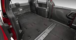Display The Dodge Grand Caravan With The Available Class Exclusive Super Stow N Go Seating And Storage System Features Fold Fl Grand Caravan Caravan New Dodge