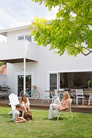 A Bright And Breezy Beach House In Newcastle Nsw Beach House Interior White Exterior Houses Beach House Style