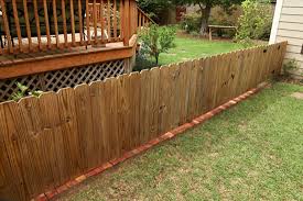 A fence gate can be broken with anything, but an axe is fastest. Diy Brick Fence Border