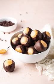 About this item mini size milk chocolate buckeyes addicting snack from the. Buckeye Balls Recipe Peanut Butter And Chocolate Candy Wholefully