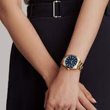 8928ob) 4.6 out of 5 stars 9,706 limited time deal Movado Movado Heritage Series Gold Watch And Bracelet With Blue Dial And Gold Accents