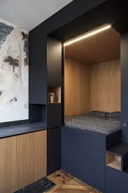 The Cube Is Connected To A Discrete Kitchenette With Built In Cabinetry Smallspaces Bedroo Small Apartment Design Small Apartment Bedrooms Small Room Design