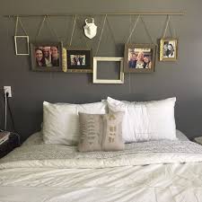 Add interest to walls by coordinating the colors in the art to the colors in your bedroom. Above Bed Ideas Hanging Pictures From A Curtain Rod Easy And Inexpensive Bedroom Wall Decor Above Bed Master Bedroom Wall Decor Above Bed Decor