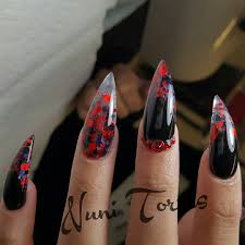 Black And Red Stiletto Nails Black Stiletto Nails With Red And Blue Glitter And Rhinestones Or As I Call Them Humanclaws Stiletto Nails Designs Black Stiletto Nails Stilleto Nails